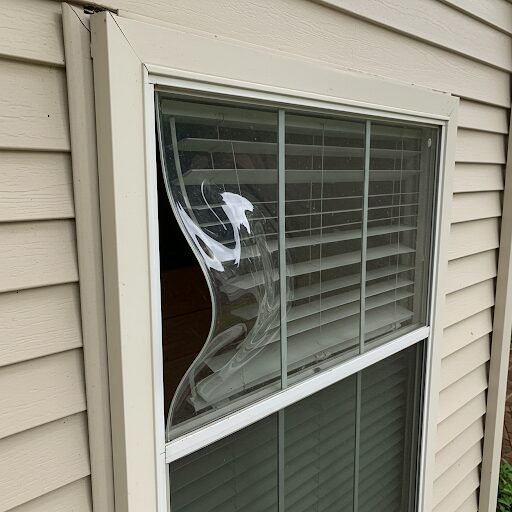 glass door repair ,frame in a Houston home caused by intense summer heat.